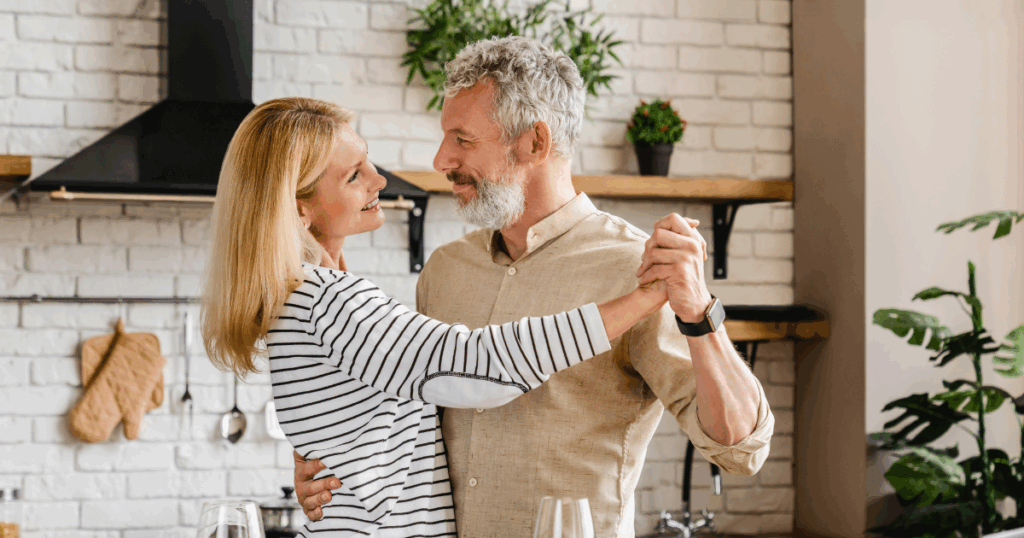 Middle aged (HENRY) couple dancing